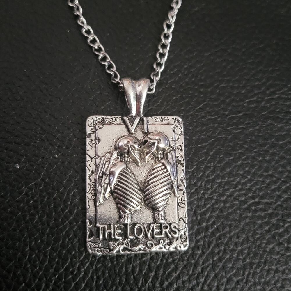 Tarot card necklace the "lovers" card as skeletons